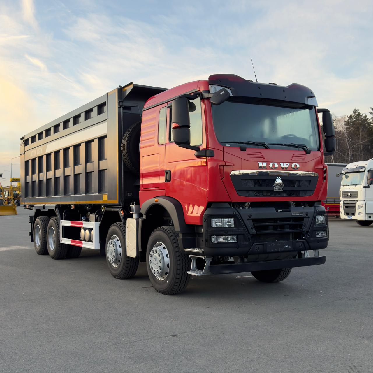 Самосвал HOWO T5G 8x4 ( ZZ3317V386GE1 ) / 7.6*2.3*1.5+0.5 / 26-35 м3 / П-образный 2024г.в.