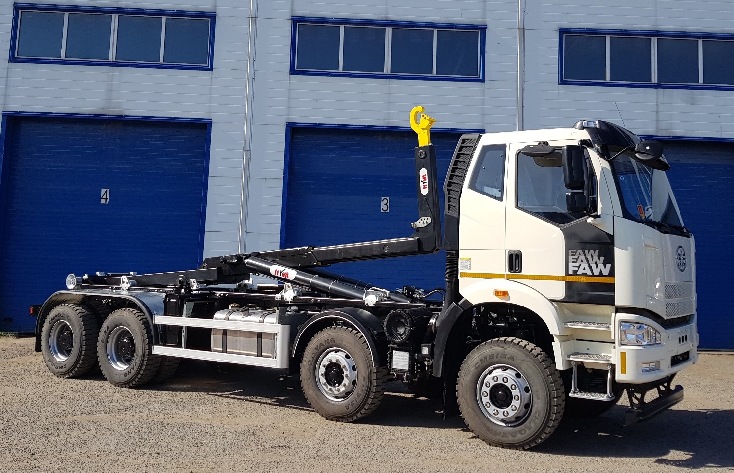 Мультилифт FAW 3310АМ (8х4) + HyvaLift TITAN 26-65-S